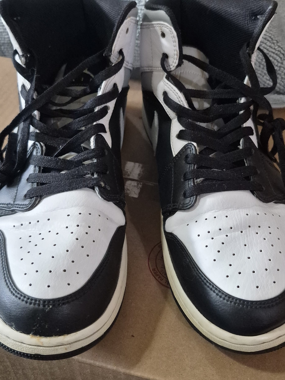Jordan Black and White High-Top Sneakers